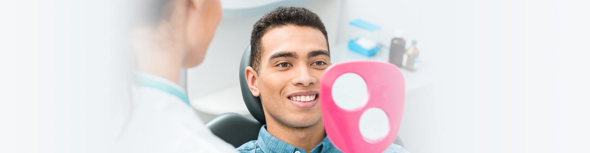 Smiling Patient at Clinic